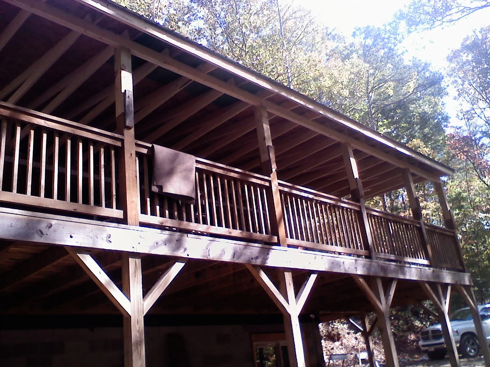 Timber framing under a new elevated porch and deck — Roof Leak Repair in Watertown by Roofing Brothers